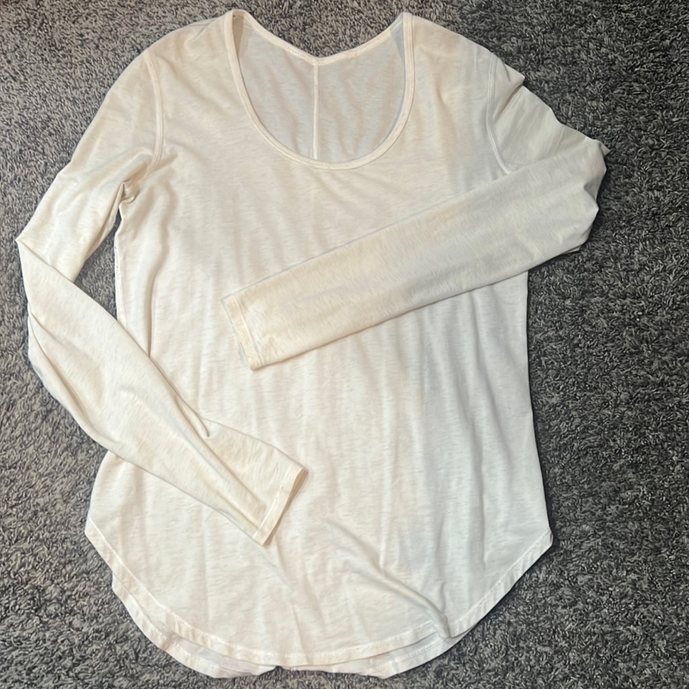 Lululemon round neck oatmeal color size 8 with thumb holes no snags in fabric